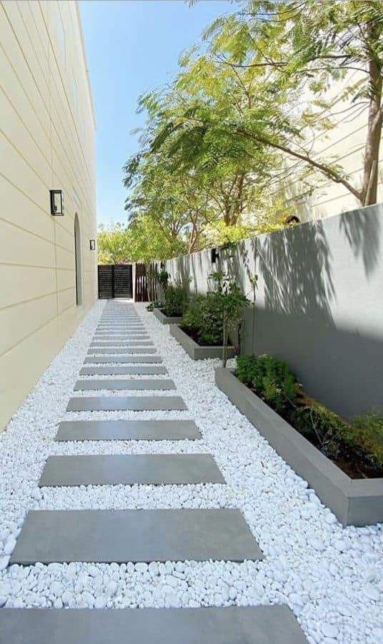 concrete footpaths leading to the gate in a central coast home