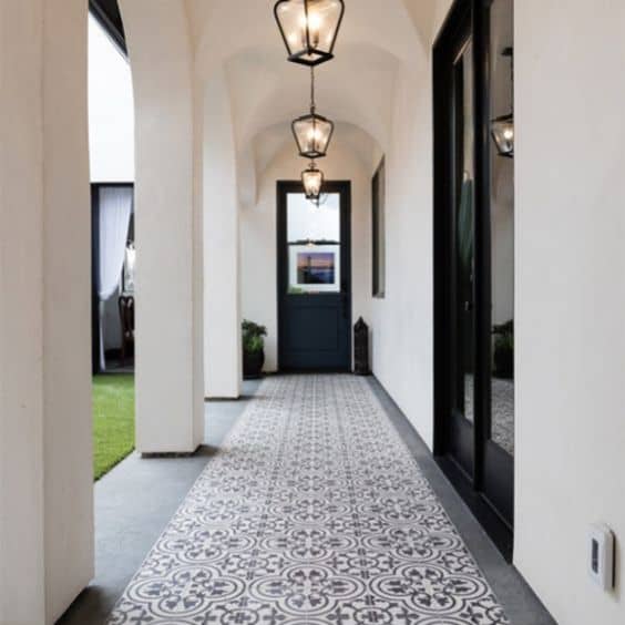 The intricate patterns and textures of stencilled concrete add charm and elegance to the outdoor space, creating a visually appealing and stylish pathway in Central Coast