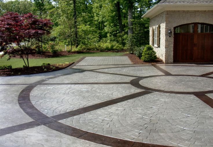 Circular designs with brick and line decorative concrete gives sort of a medieval look in Central Coast